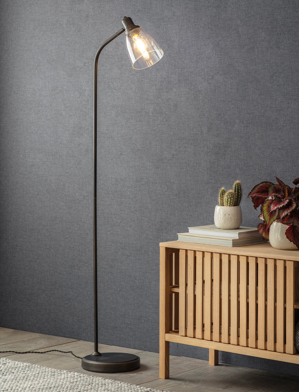 Garden Trading Hoxton Dome Floor Lamp by Cornucopia Home with a sleek metal dome and sturdy base, ideal for modern living spaces.