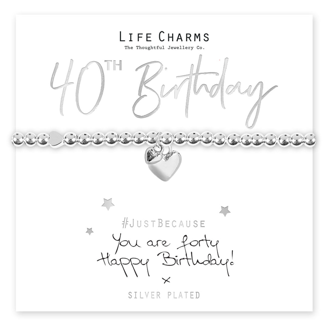 Cornucopia Home and Gift You Are 40 Hearts bracelet with life charms, featuring a silver-tone design and heart-shaped accents.