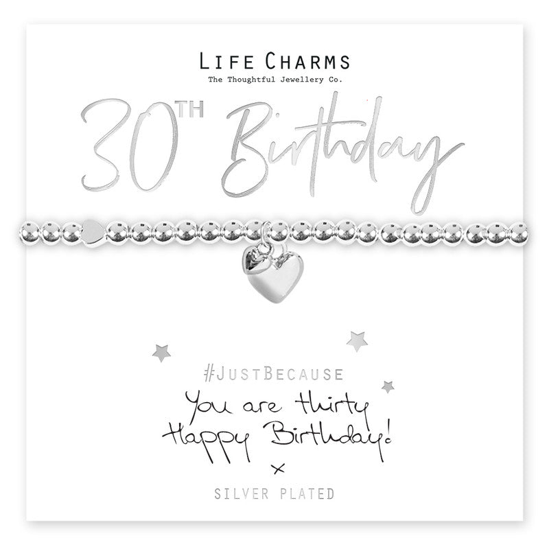 Life charms bracelet featuring 30 heart charms from Cornucopia Home and Gift, showcasing a delicate, handcrafted jewelry piece.