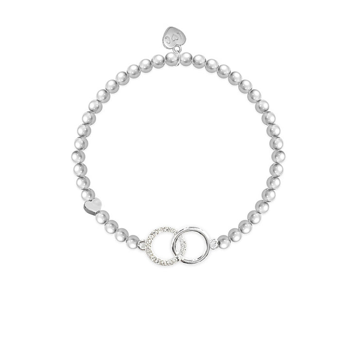 Silver granddaughter bracelet from Cornucopia Home and Gift with life charms, featuring a delicate design and meaningful details.