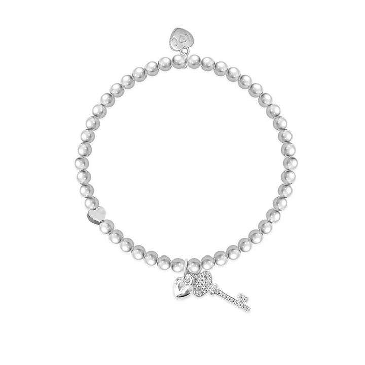 Life charms key bracelet with "You Are 21" charm by Cornucopia Home and Gift, featuring a silver-tone key and decorative beads.
