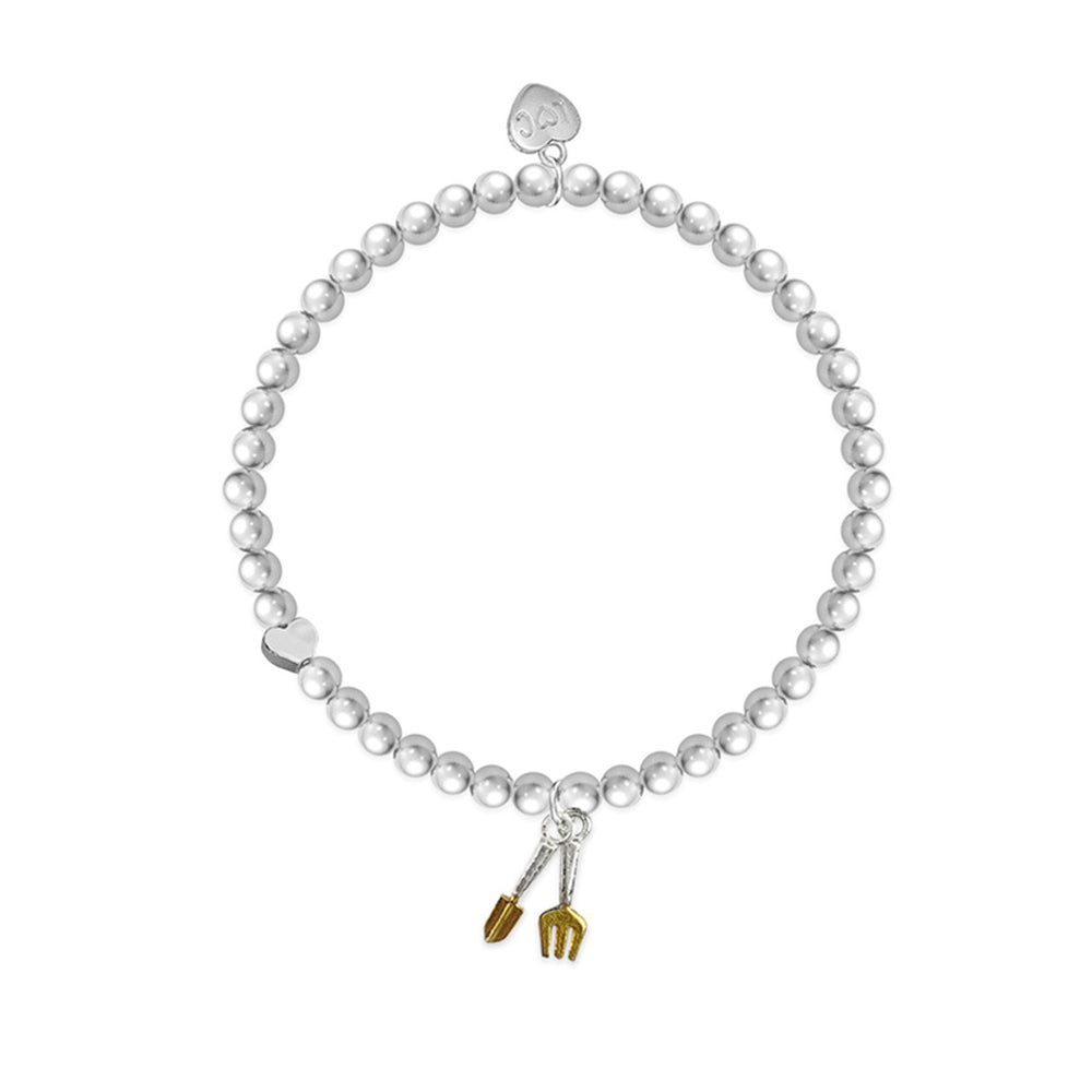 On You're Retirement bracelet with life charms, featuring meaningful silver charms on a delicate bracelet from Cornucopia Home and Gift.