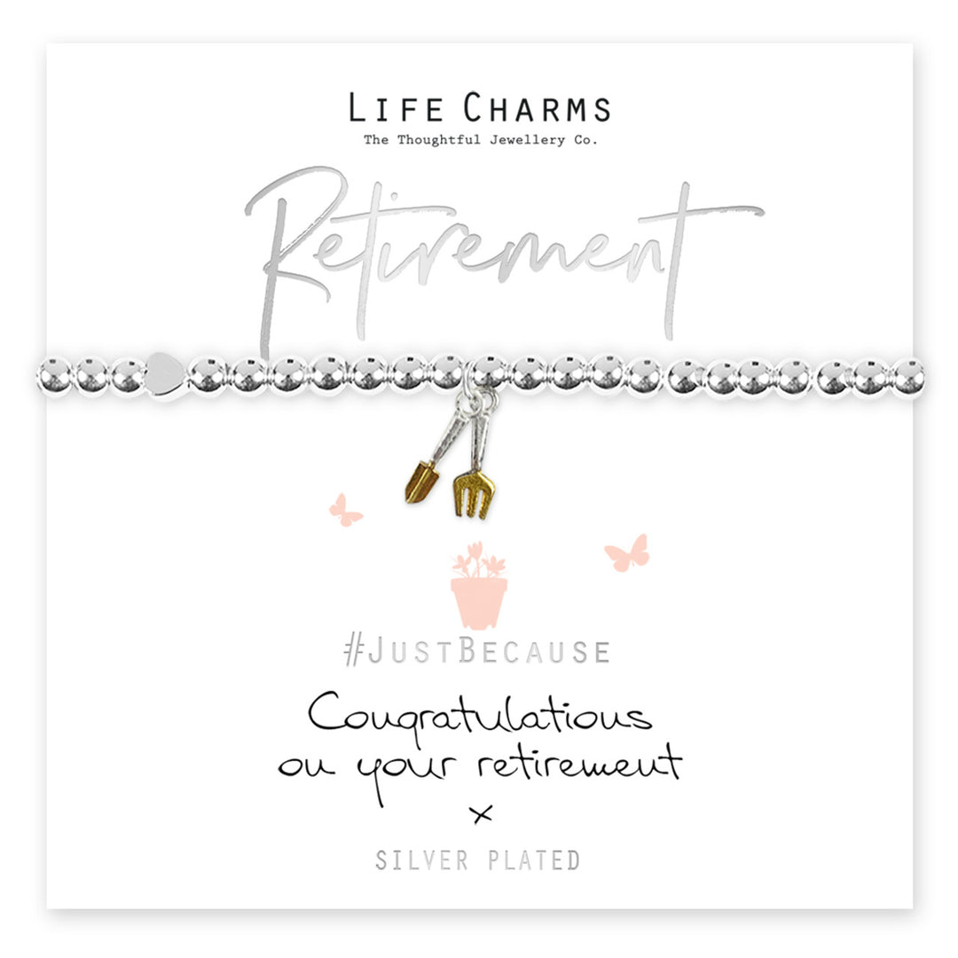 Life charms retirement bracelet featuring colorful beads and charms, designed by Cornucopia Home and Gift.