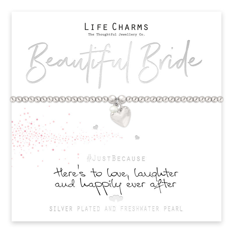 Beautiful bride bracelet from Cornucopia Home and Gift featuring elegant life charms on a delicate bracelet.