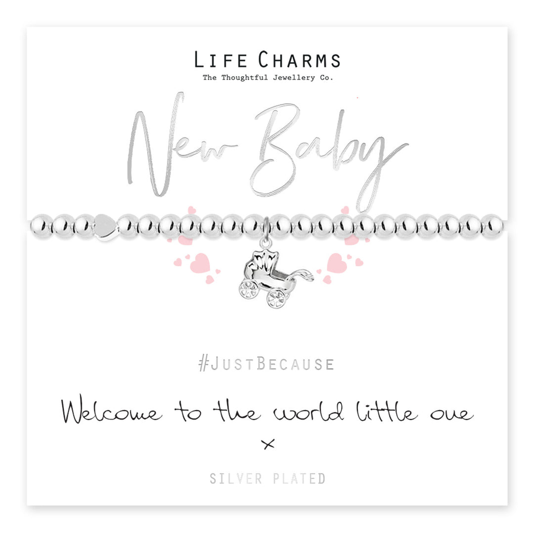 New baby bracelet with life charms from Cornucopia Home and Gift, featuring delicate design and meaningful charms.