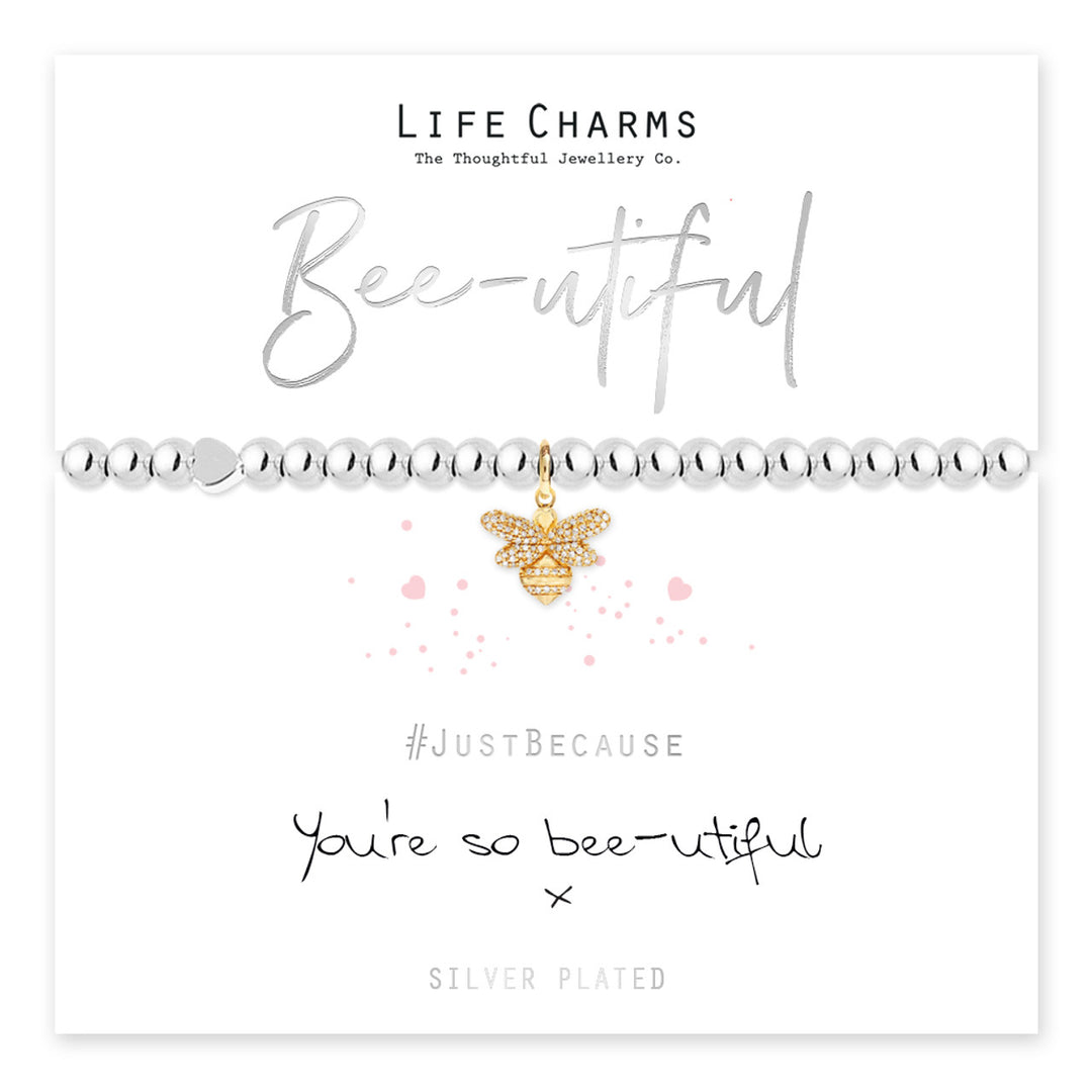 Bee-utiful Bee Charms bracelet by Cornucopia Home and Gift featuring delicate life charms on a silver band.