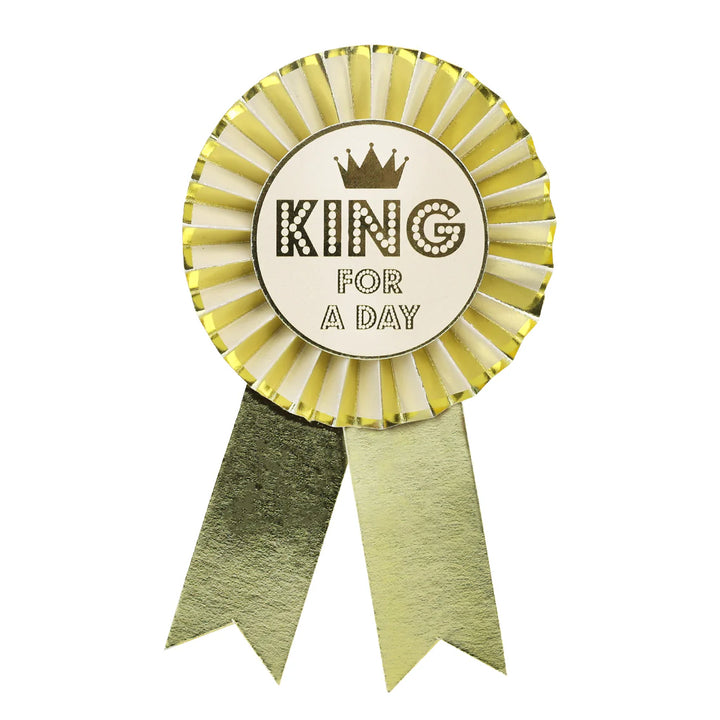 Gold "King For A Day" birthday rosette badge by Talking Tables featuring a festive design and decorative ribbon for celebration.