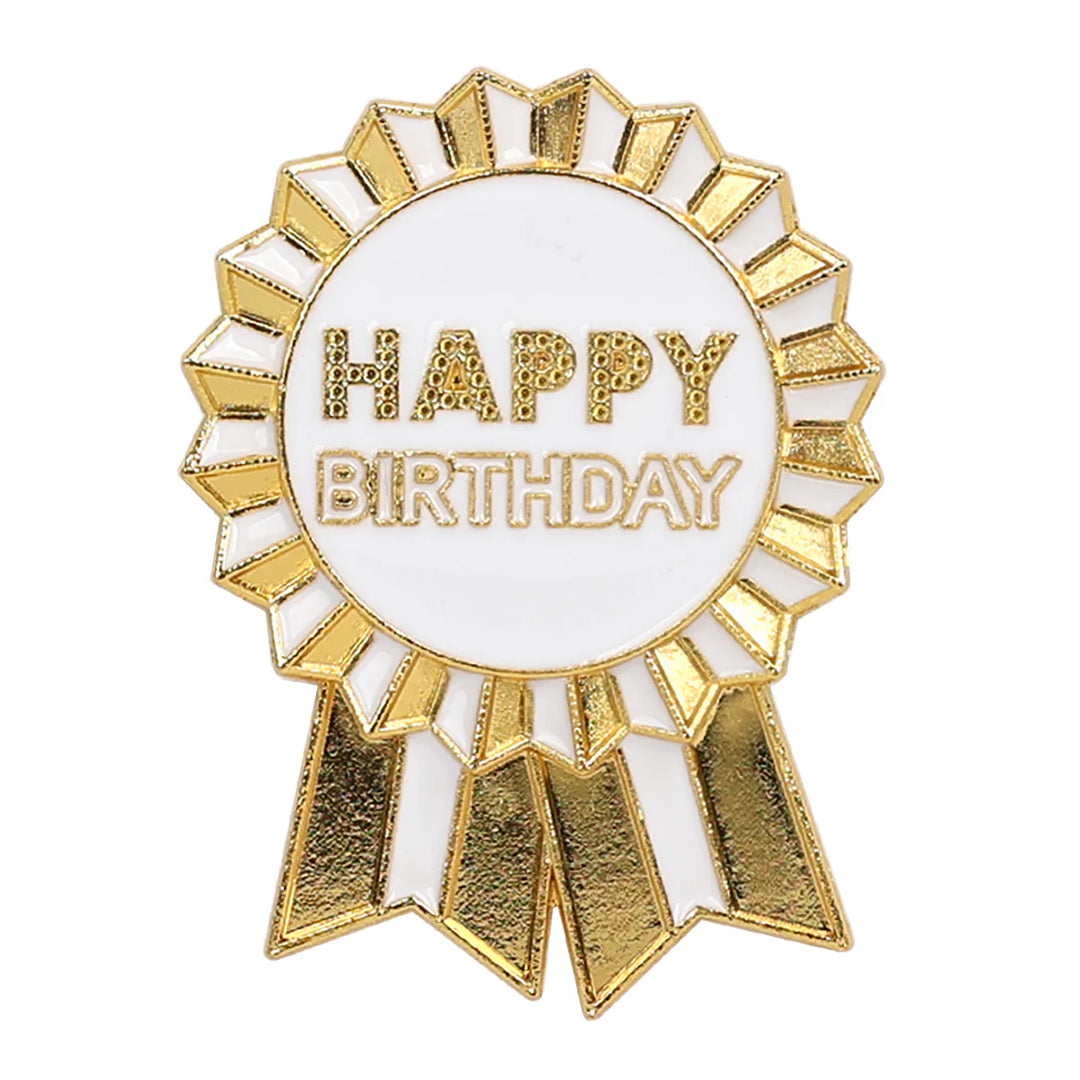 Gold enamel "Happy Birthday" pin badge by Talking Tables, featuring a luxe design from Cornucopia Home and Gift.