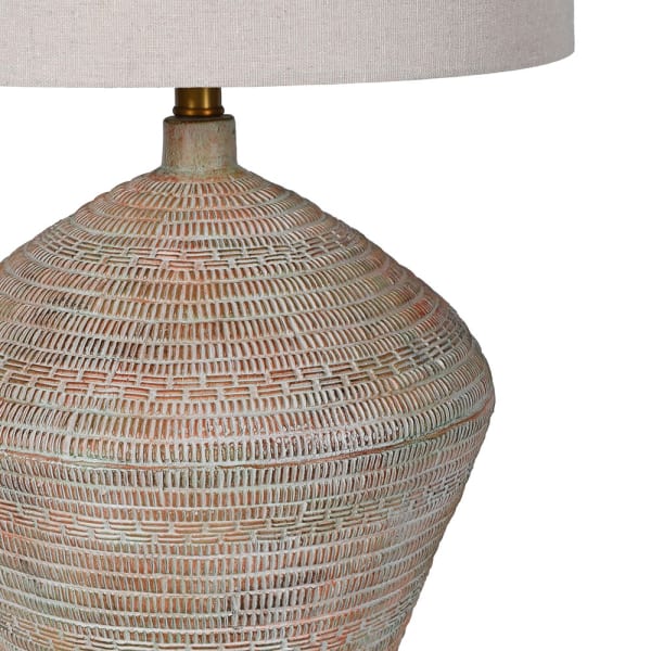Concrete lamp with linen shade from Coach House by Cornucopia Home and Gift, featuring a modern design and textured finish.