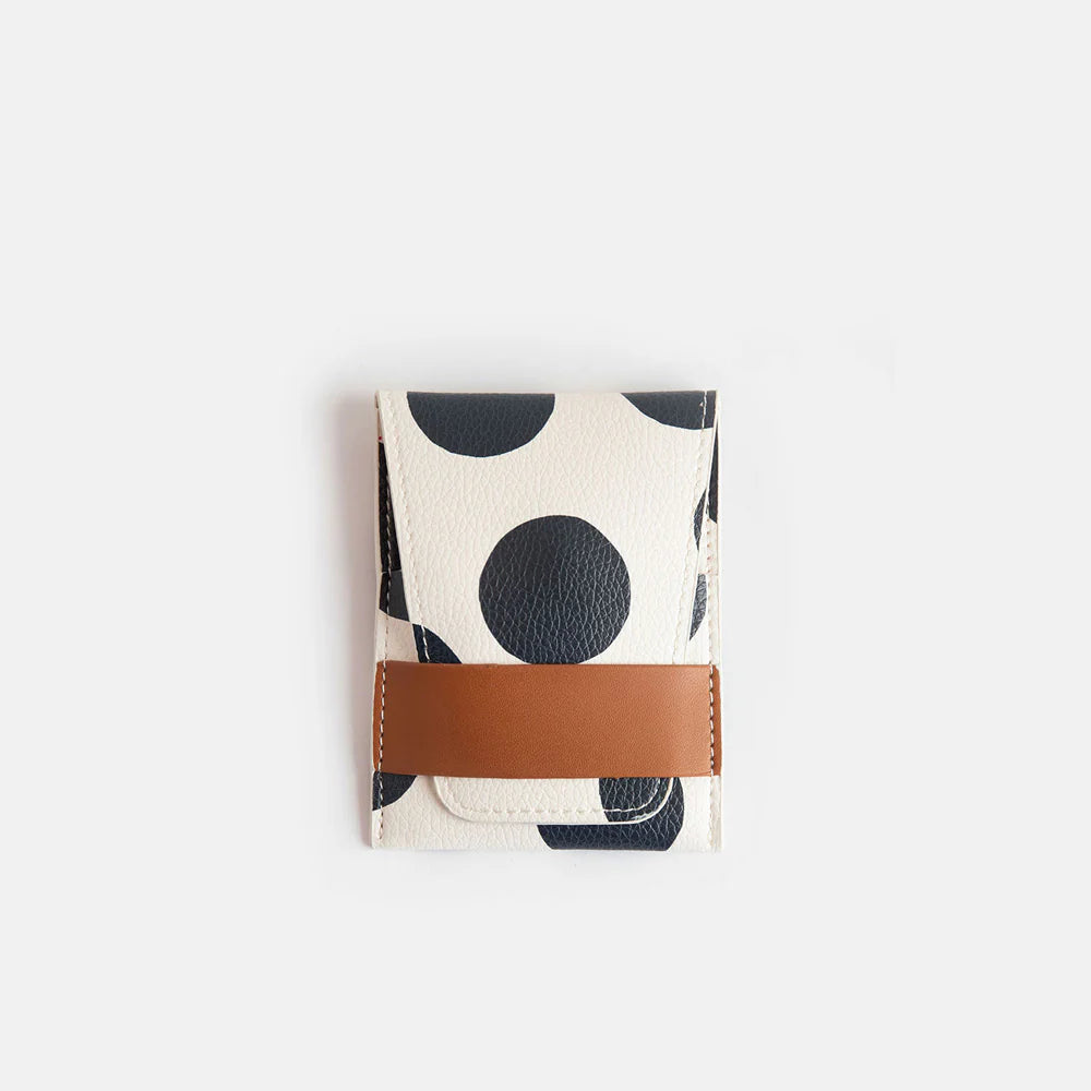 Caroline Gardner scattered dot manicure set with nail tools in a compact case, perfect for gifting or personal beauty care.