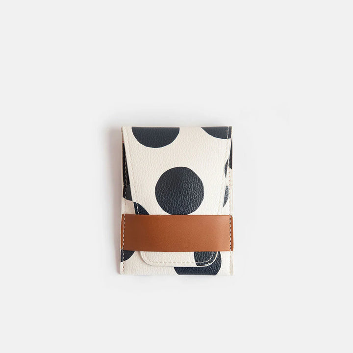 Caroline Gardner scattered dot manicure set with nail tools in a compact case, perfect for gifting or personal beauty care.