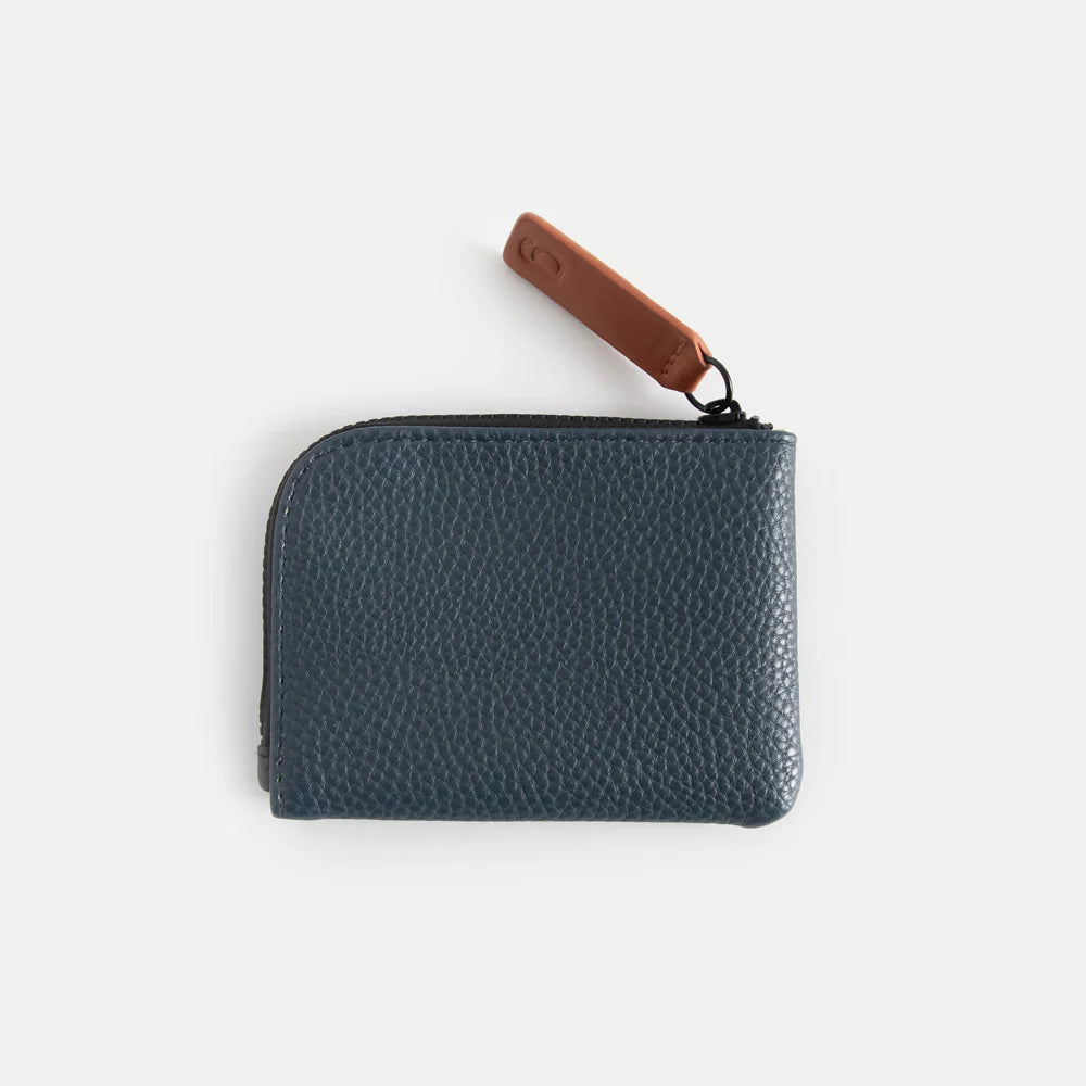 Caroline Gardner black and navy corner zip card holder with multiple card slots, designed for compact organization.