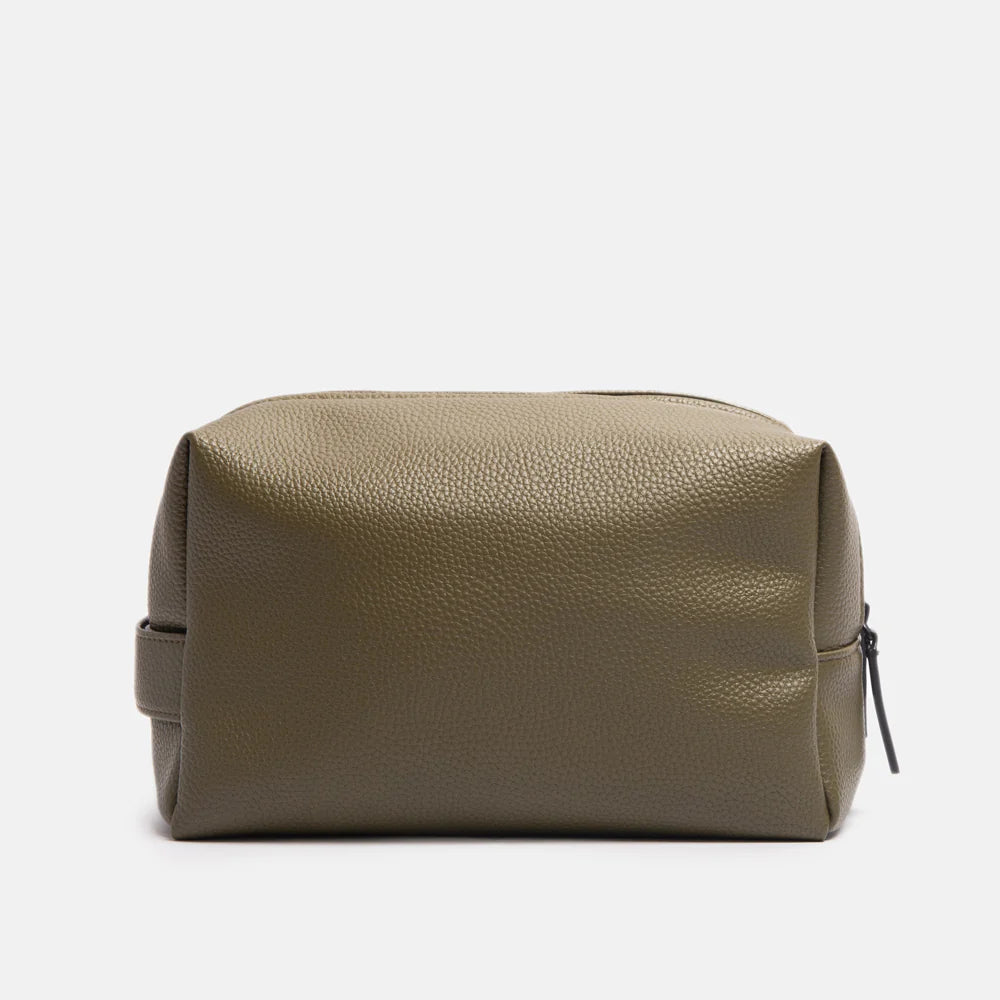Large dark green Caroline Gardner travel washbag with spacious interior and secure zipper, ideal for organizing toiletries.