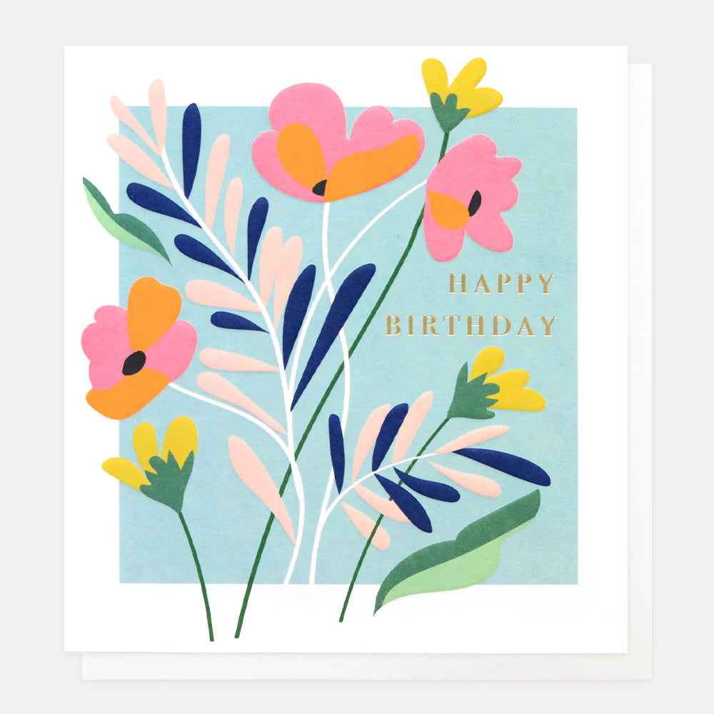 Blue floral Caroline Gardner birthday card with vibrant flower illustrations on a white background.