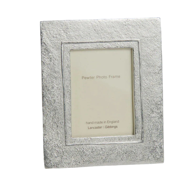 Handmade large raised line pewter mini photo frame by Lancaster and Gibbings, perfect for showcasing small photos in a stylish display.