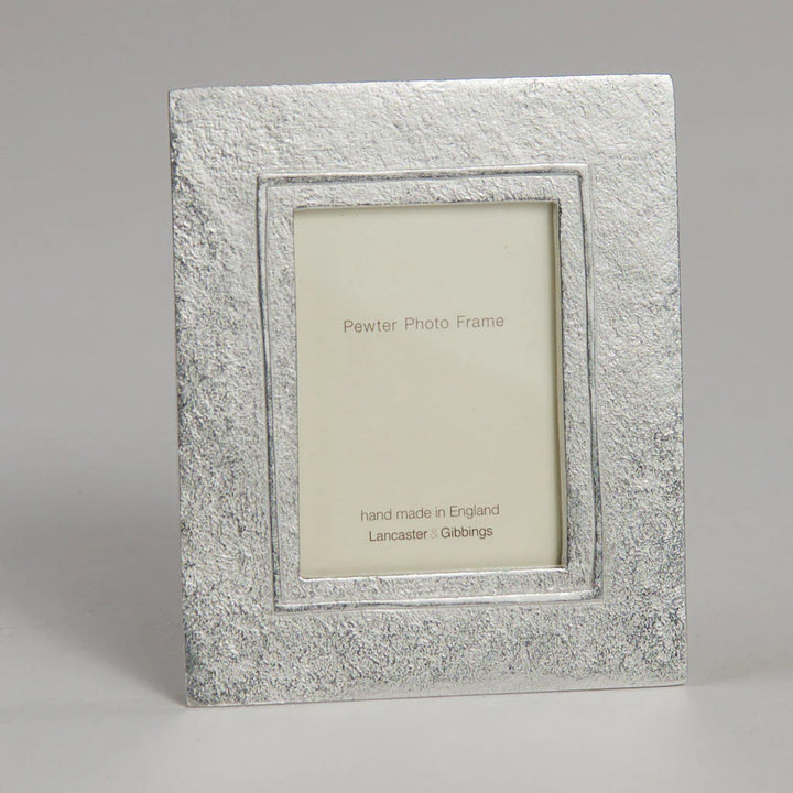Handmade large raised line pewter mini photo frame by Lancaster and Gibbings, perfect for displaying small photos.