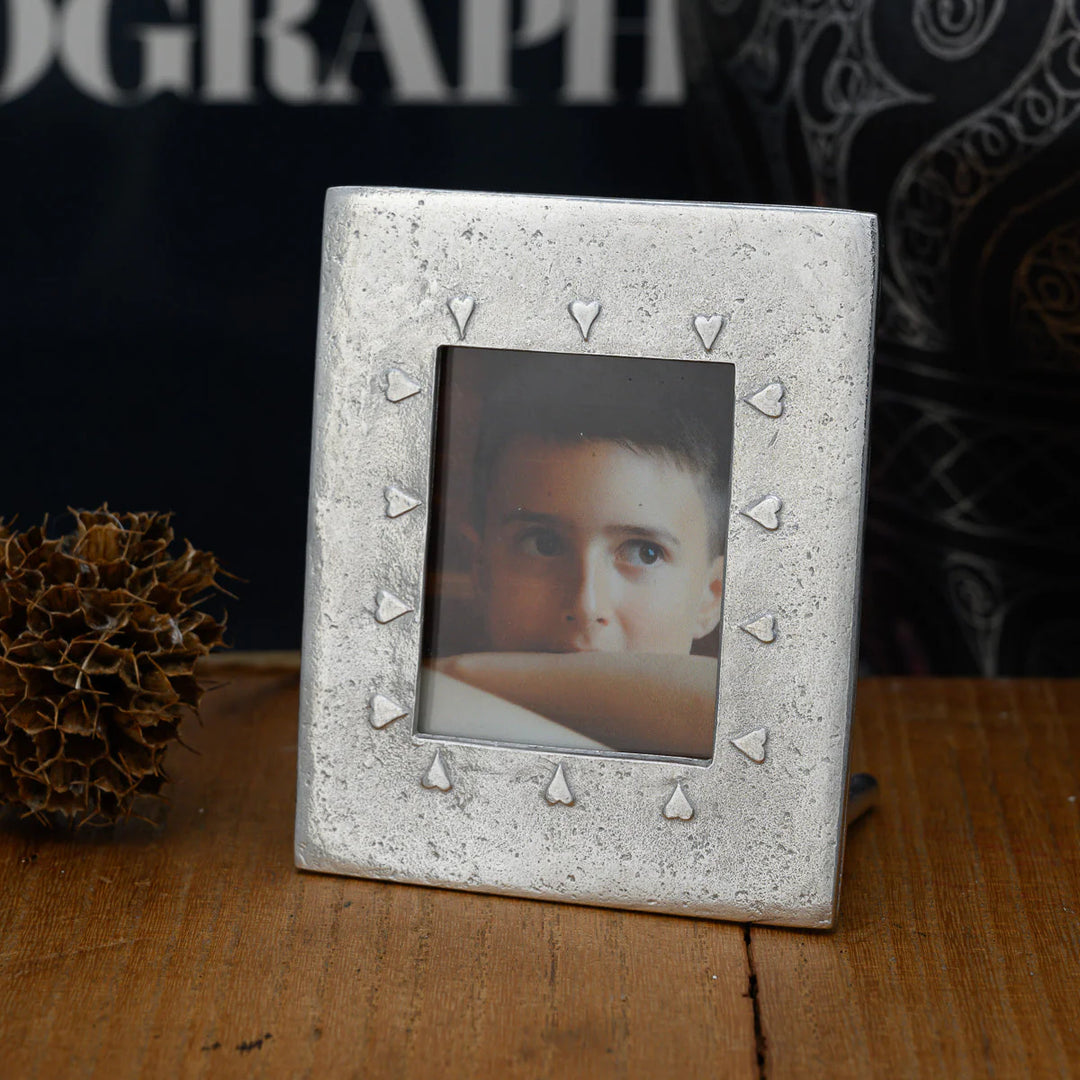 Handmade Lancaster and Gibbings mini pewter photo frame with heart details, ideal for small photos or keepsakes.