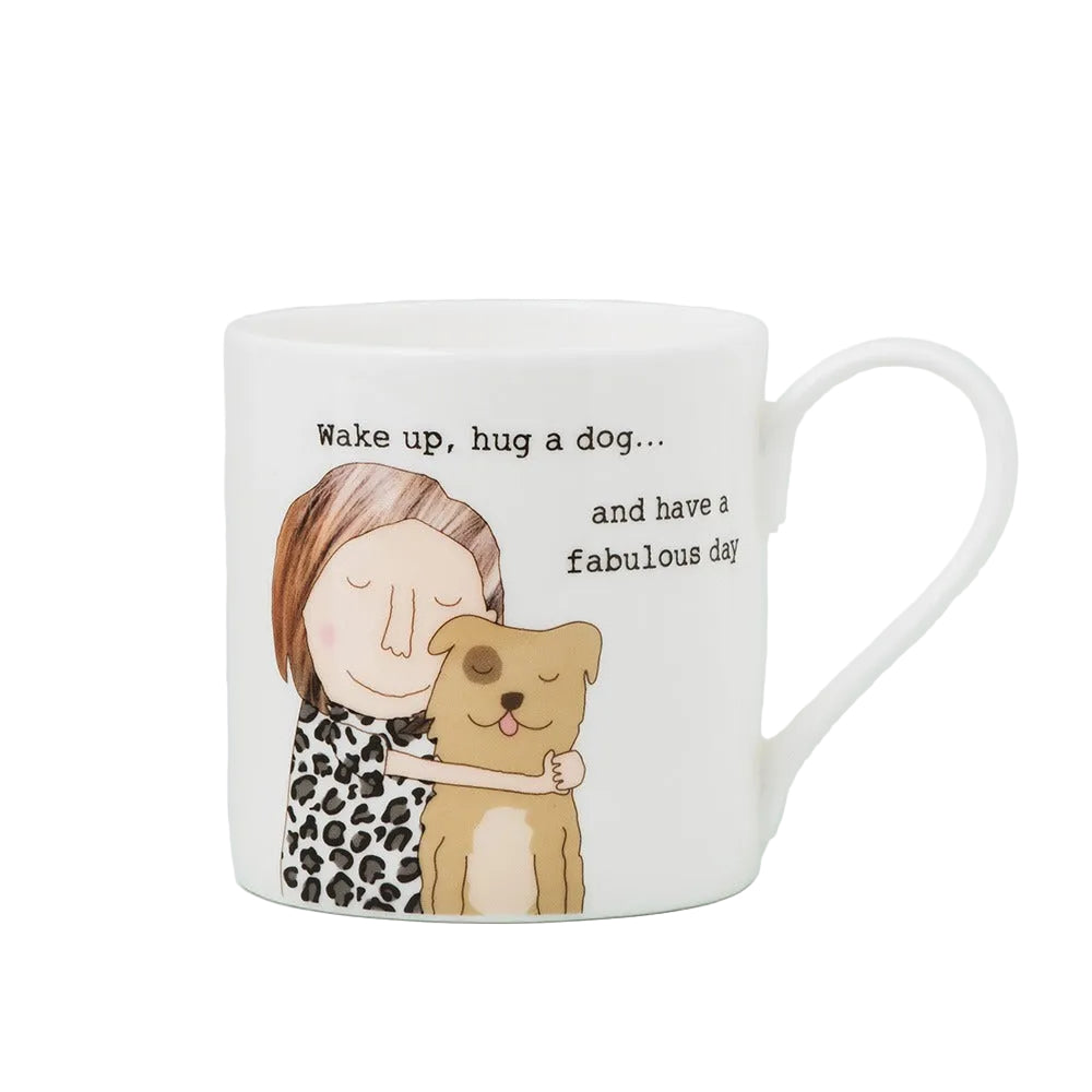 Ceramic mug featuring a cute dog design from the Hug A Dog collection by Rosie Made a Thing, ideal for dog lovers.