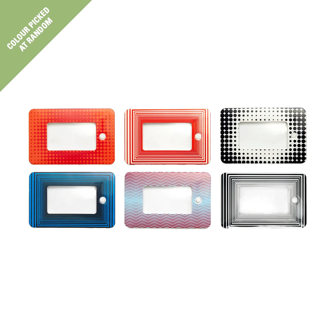 Kikkerland Light Up Magnifier showing an illuminated lens with assorted colors for detailed viewing and reading.