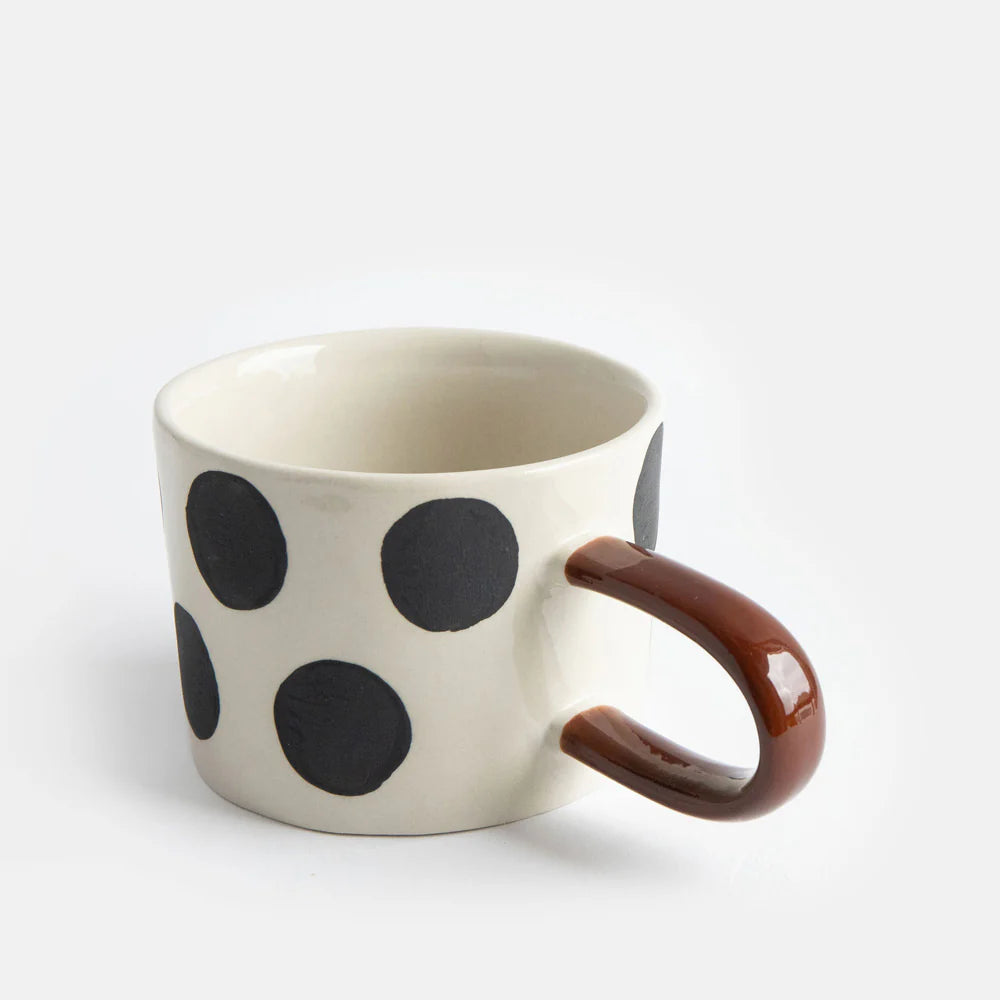 Caroline Gardner mono scattered dots mug with a white background and black dot pattern, perfect as a gift from Cornucopia Home.