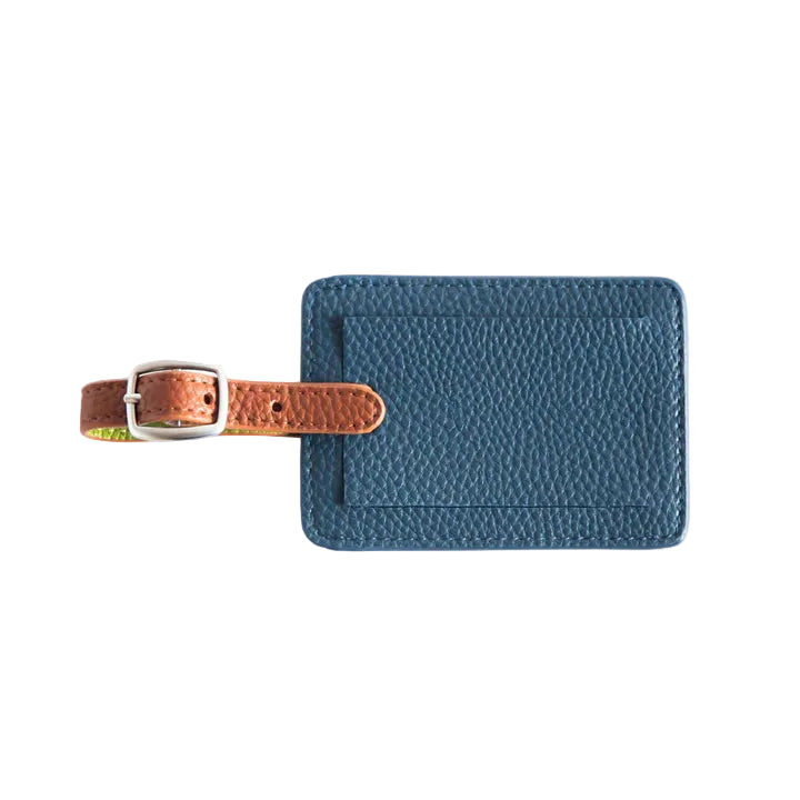 Caroline Gardner navy luggage tag with floral design, durable leather strap, and clear ID window for travel accessories.