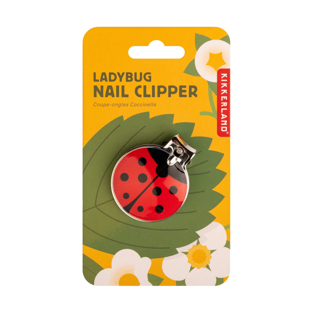 Kikkerland ladybug nail clipper with colorful packaging, designed for precise nail trimming and compact travel use.