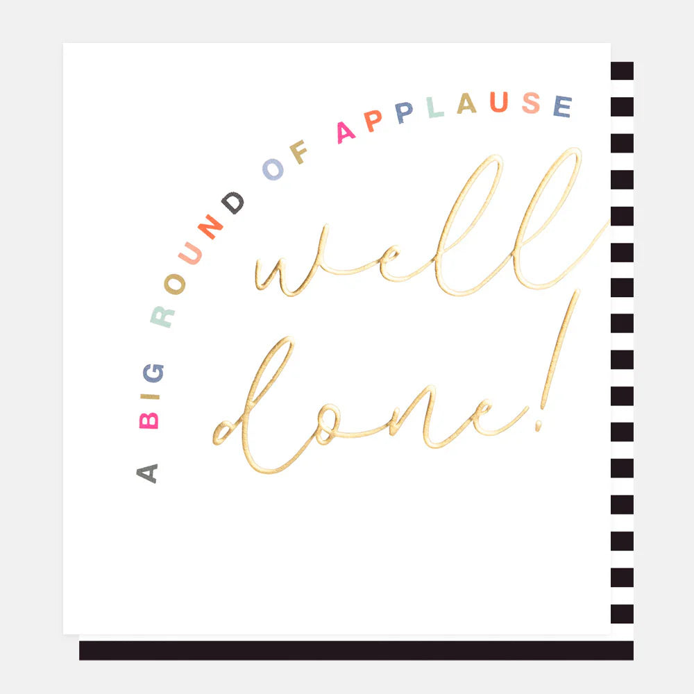 Caroline Gardner "A Big Round Of Applause Well Done" decorative text sign with bold black lettering on a white background.