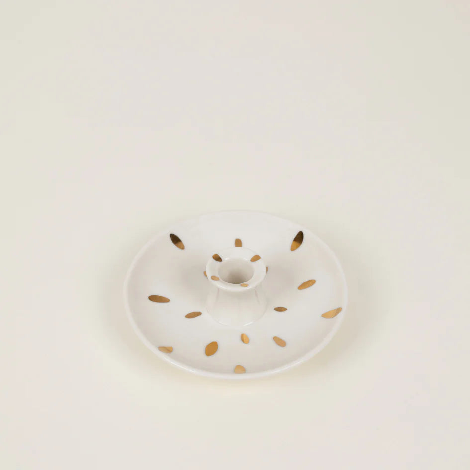 Mini gold candle holder from St Eval, featuring a brush mark design, ideal for decorative candle display