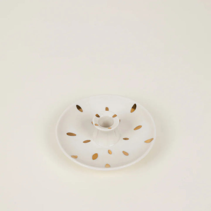 Mini gold candle holder from St Eval, featuring a brush mark design, ideal for decorative candle display