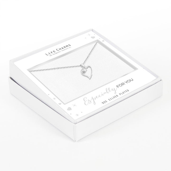 Open heart necklace with zirconia stone charm from Life Charms by Cornucopia Home and Gift, featuring a delicate silver-tone design.