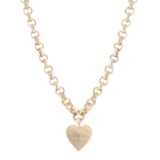 Gold Solace Necklace by Tutti &amp; Co featuring textured surface, displayed on a neutral background.