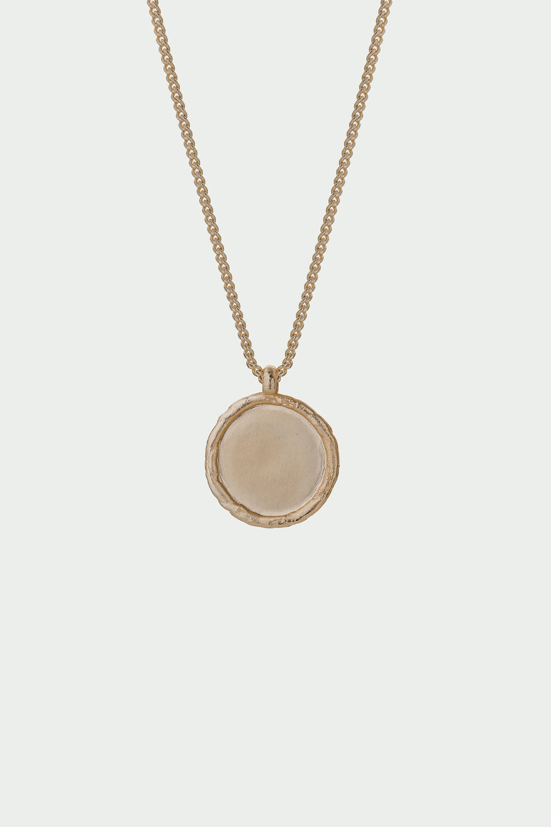 Gold Arc Necklace by Tutti &amp; Co featuring a sleek, curved design, displayed on a neutral background.