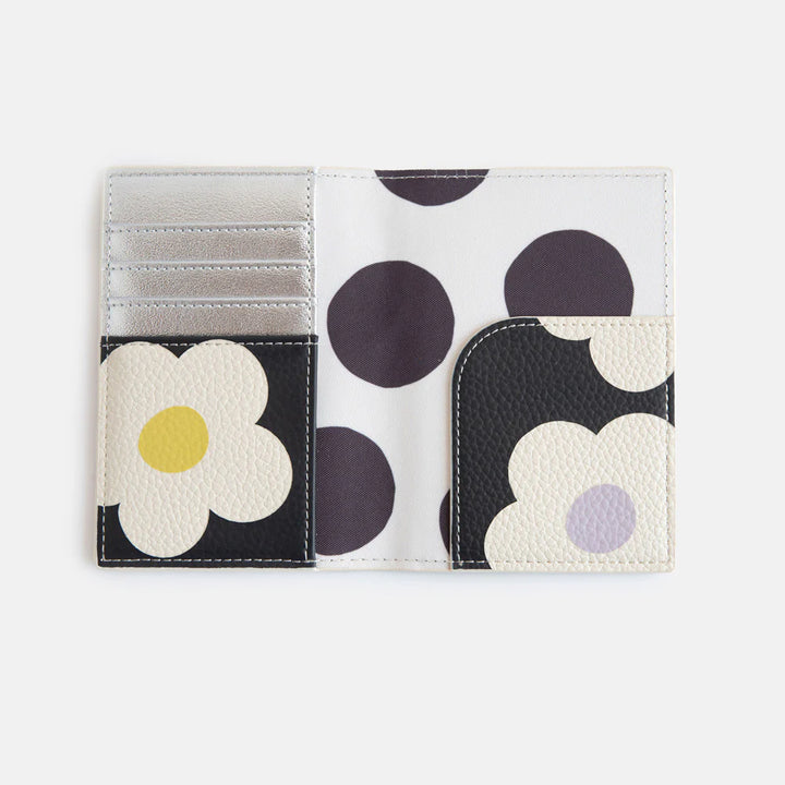 Caroline Gardner multi-flower charcoal passport holder with floral pattern, designed for travel and organization.