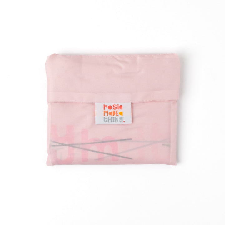 Packable Gin Bag by Rosie Made a Thing, a compact and foldable bag from Cornucopia Home and Gift, shown folded in the image.