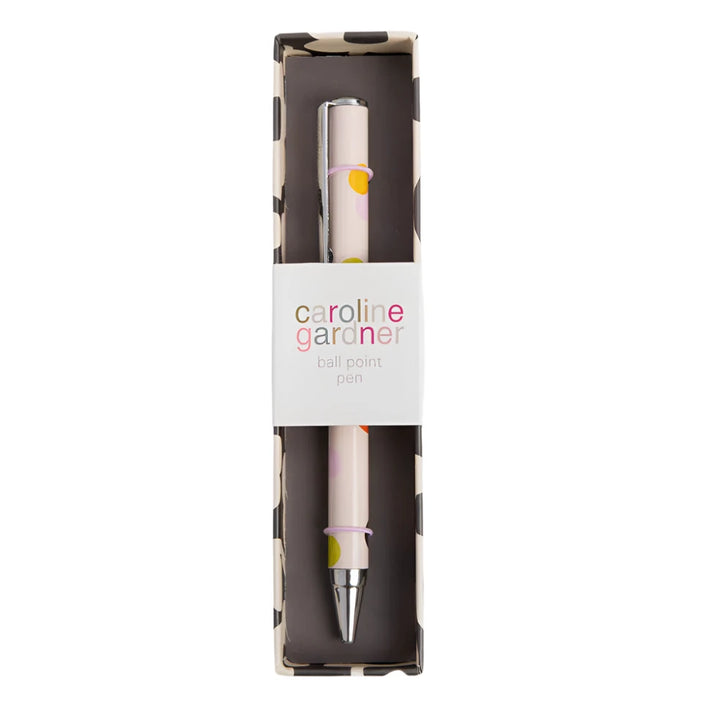 Pale pink Caroline Gardner Dotty Ballpoint Pen with gold accents, perfect for gifting or everyday writing.