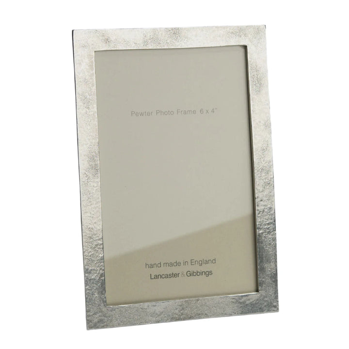 Handmade sandstone and cast pewter photo frame by Lancaster and Gibbings, perfect for displaying cherished photos.