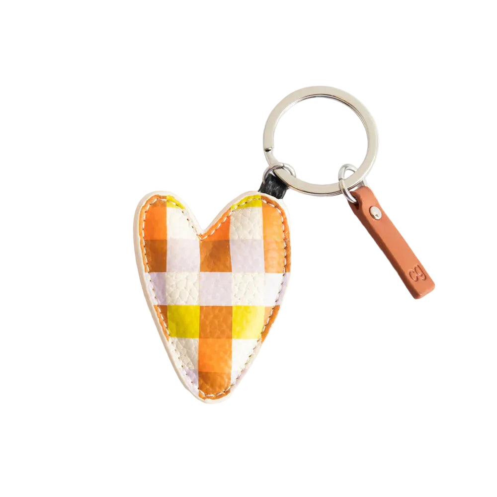 Heart-shaped checkered keychain with a brown handle on a white background