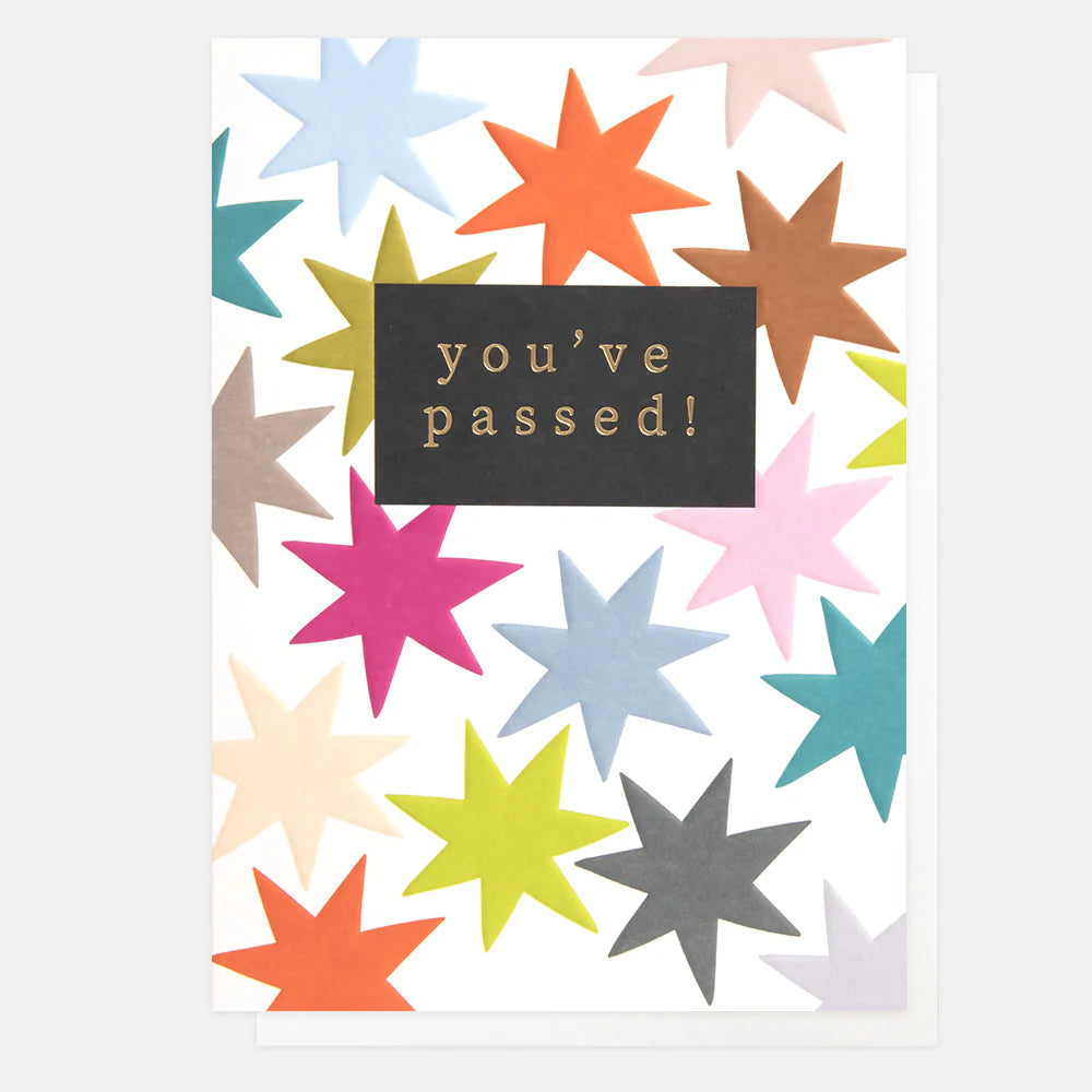Colorful star-themed greeting card from Caroline Gardner's You've Passed collection, featuring vibrant star illustrations.