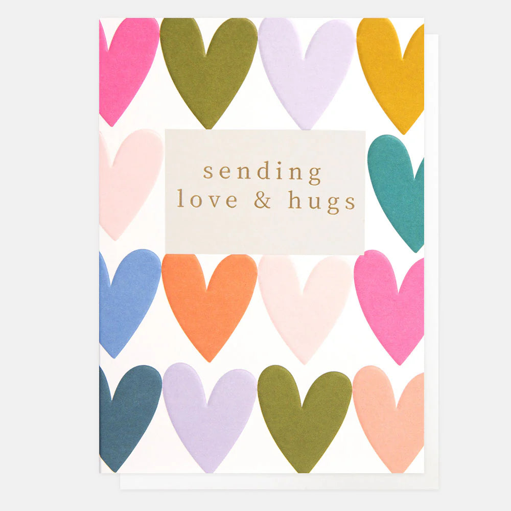 Caroline Gardner Sending Love and Hugs Heart Rows decorative print with colorful heart illustrations on a white background.
