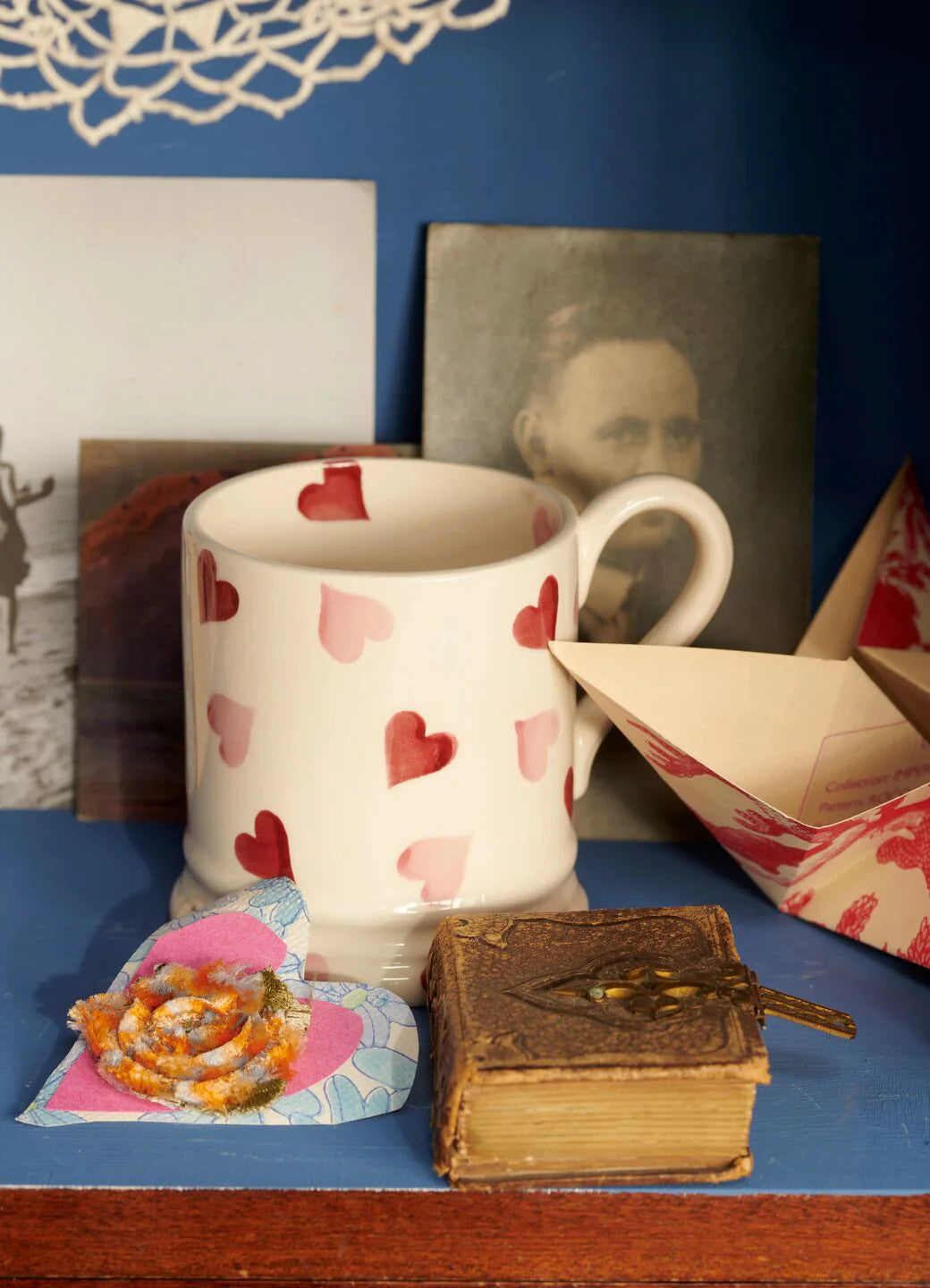 Emma Bridgewater pink hearts 1/2 pint mug with a charming heart pattern, ceramic handle, and glossy finish.