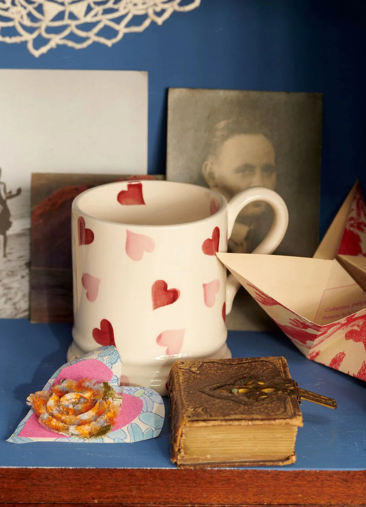 Emma Bridgewater pink hearts 1/2 pint mug with a charming heart pattern, ceramic handle, and glossy finish.