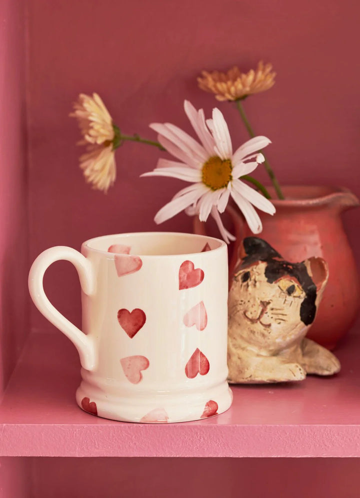 Emma Bridgewater Pink Hearts 1/2 Pint Mug with pink heart pattern, ceramic, featuring a classic mug shape and vibrant pink design.