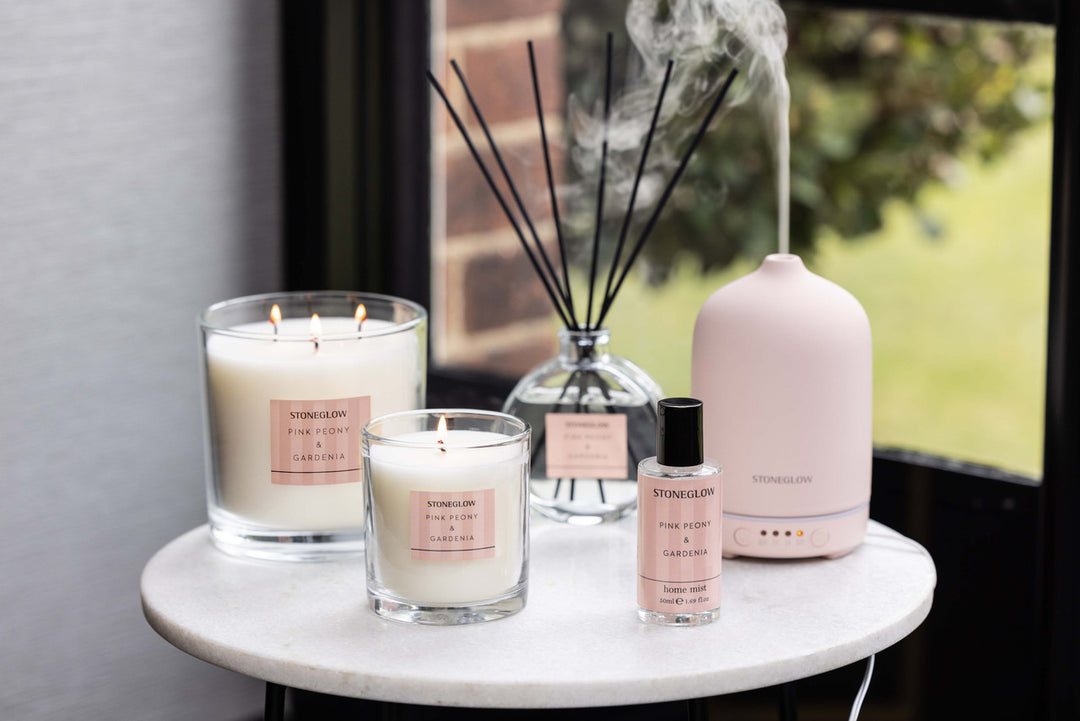Stoneglow Modern Classics pink peony and gardenia boxed tumbler candle with floral design and elegant packaging.