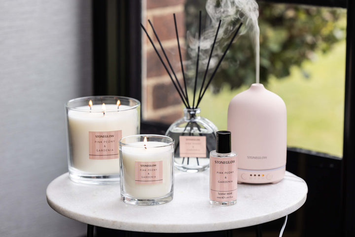 Stoneglow Modern Classics pink peony and gardenia boxed tumbler candle with floral design and elegant packaging.