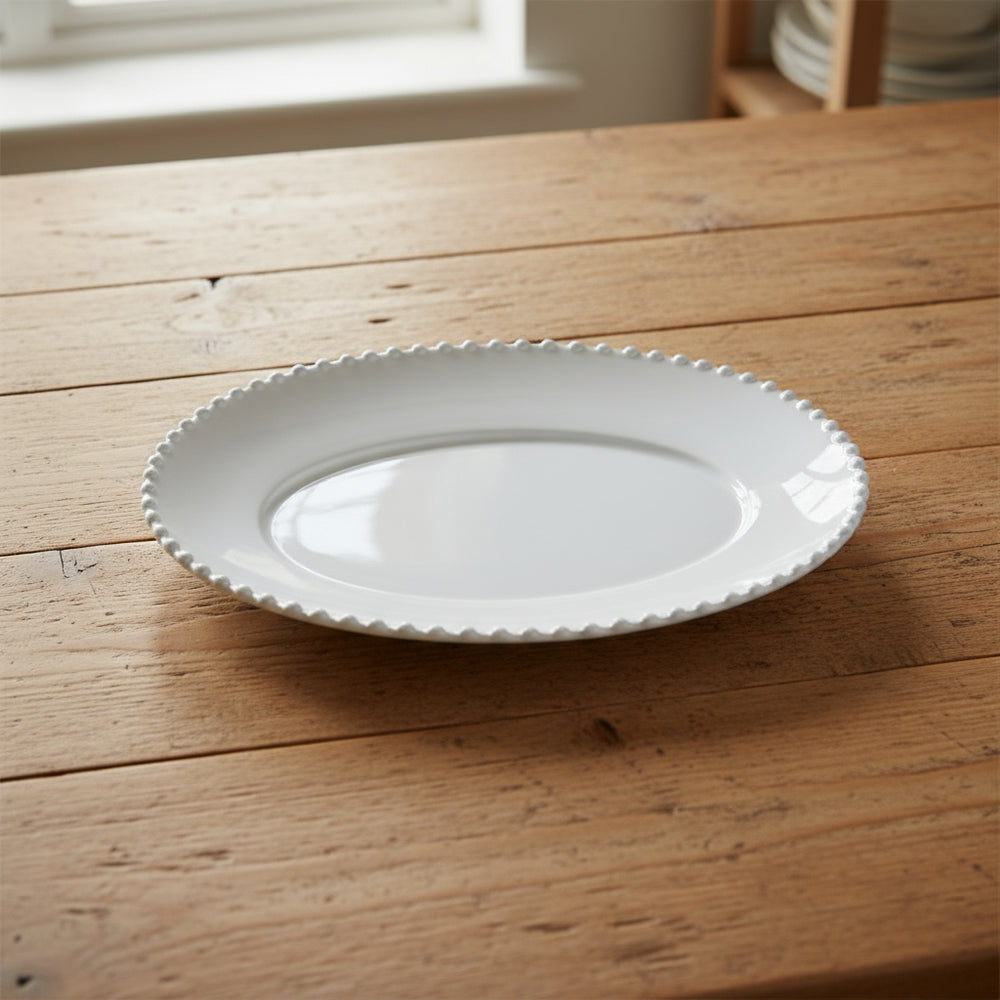 Pearl white oval platter by Cornucopia Home and Gift, 34cm, elegant ceramic serving dish with smooth finish and classic design.