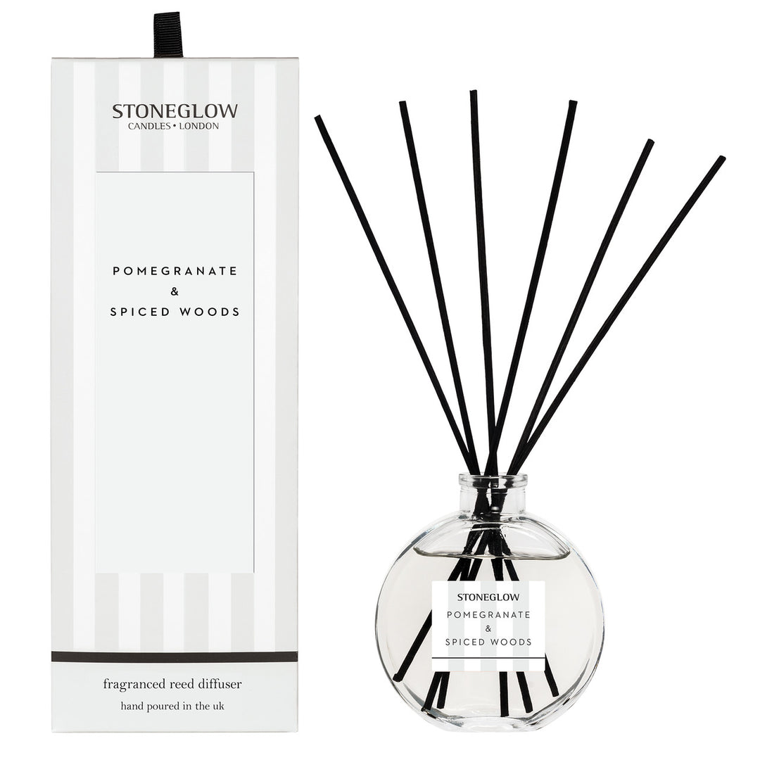 Stoneglow Modern Classics Pomegranate and Spiced Woods reed diffuser in a 120ml bottle with decorative design.