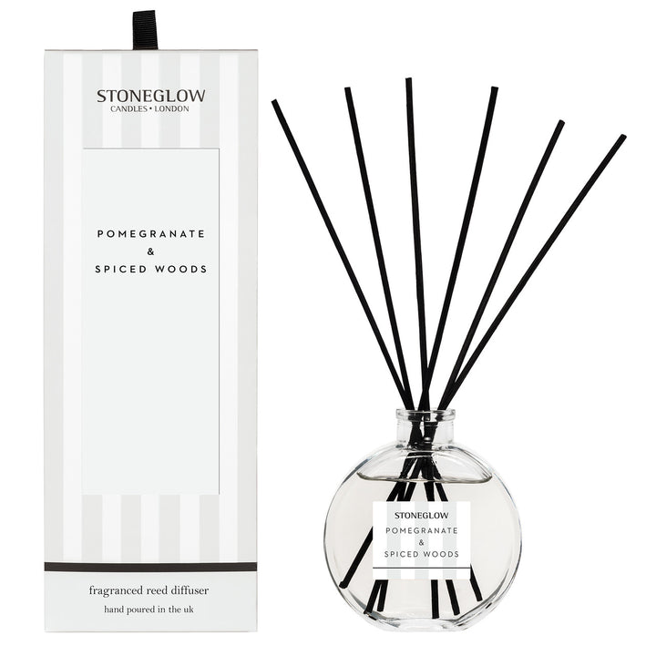 Stoneglow Modern Classics Pomegranate and Spiced Woods reed diffuser in a 120ml bottle with decorative design.