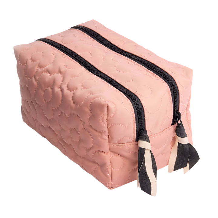 Pink quilted flower cube washbag by Caroline Gardner featuring a floral design and compact shape for travel storage