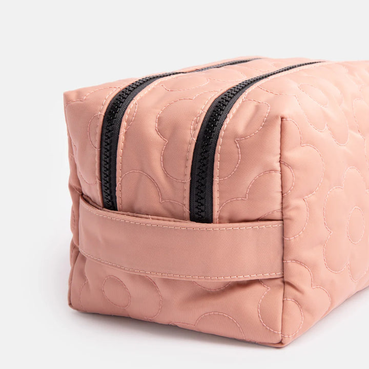 Pink quilted flower cube washbag by Caroline Gardner with floral pattern, compact and stylish for travel or everyday use.