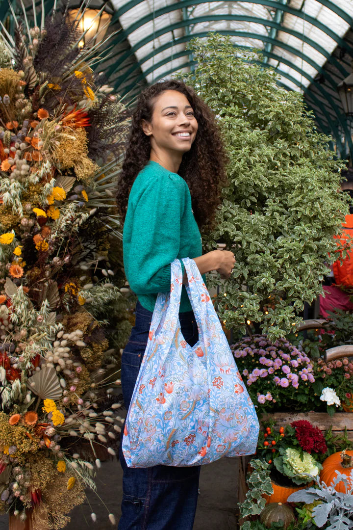 William Morris Golden Lily Kind Bag by Cornucopia Home and Gift featuring floral design with golden lily pattern in lifestyle setting